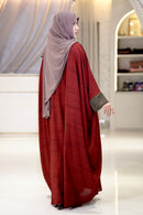 Woman wearing georgette kaftan with elegant modest fashion styling