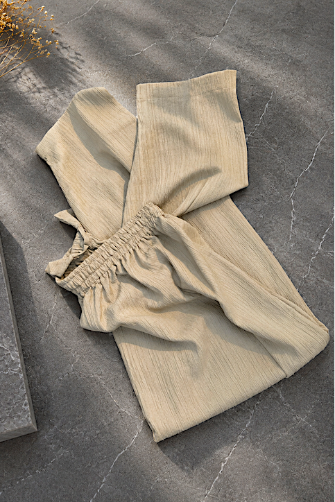 Sage green textured georgette trousers by Modest Collection, featuring a narrow-cut design with a 15-inch flare, perfect for contemporary modest professional wear.