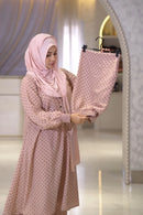 Woman wearing red georgette hijab with elegant modest fashion styling