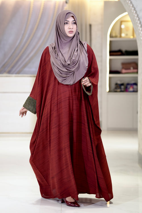 Woman wearing georgette kaftan with elegant modest fashion styling