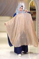 Woman wearing cream silk modest dress with elegant modest fashion styling