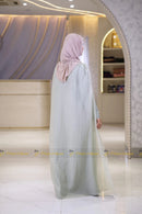 Premium modest Elsa inspired dress with textured fabric and flowing drape
