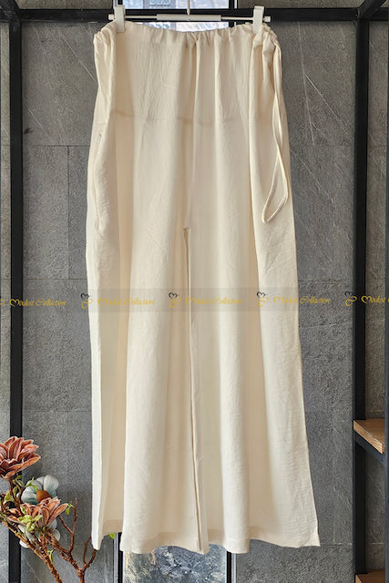 تنورة طويلة مطبوعة باللون الوردي الفاتح