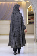 Side view of grey georgette khimar with black polka dots and pockets, flowy summer modest wear for women