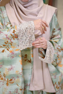 close view of a maternity kaftan designed by modest collection