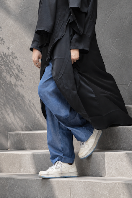 Premium slim-fit flared denim trousers with a comfortable elastic waist, designed for a modern and flattering casual modest silhouette.