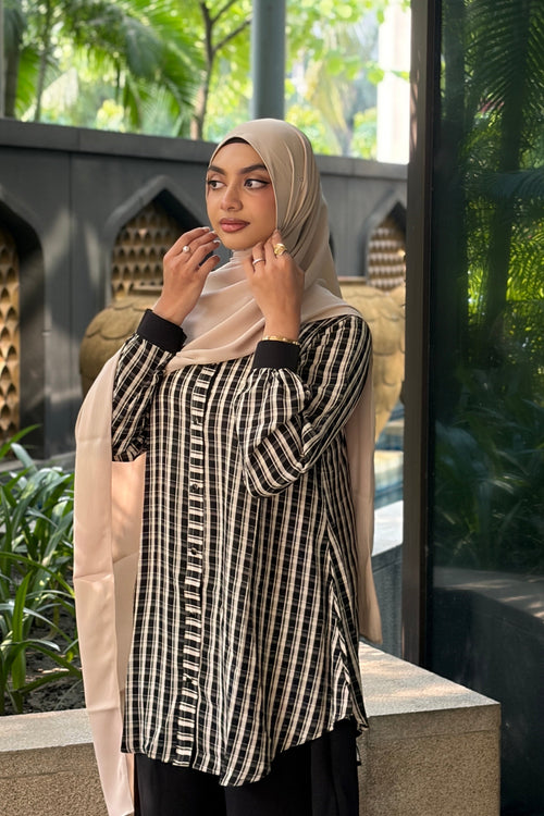 Woman wearing a 33-inch long plaid georgette shirt from Modest Collection®