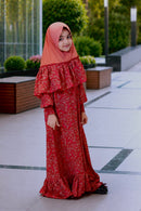 Full-length view of the Little Lyra dress featuring tiered bottom frills.