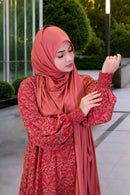 Close up of the smocking detail on the sleeves of the Lyra modest dress.