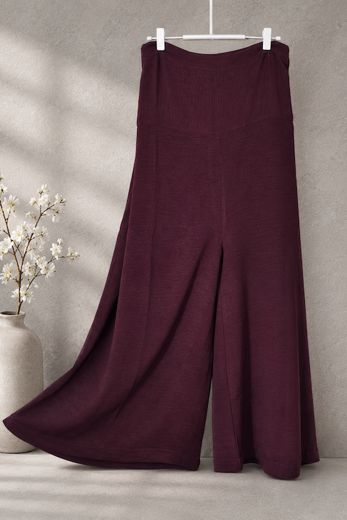 Berry extra-flared palazzo pants by Modest Collection featuring a secure side zipper pocket and adjustable waist, styled for maternity and office wear.