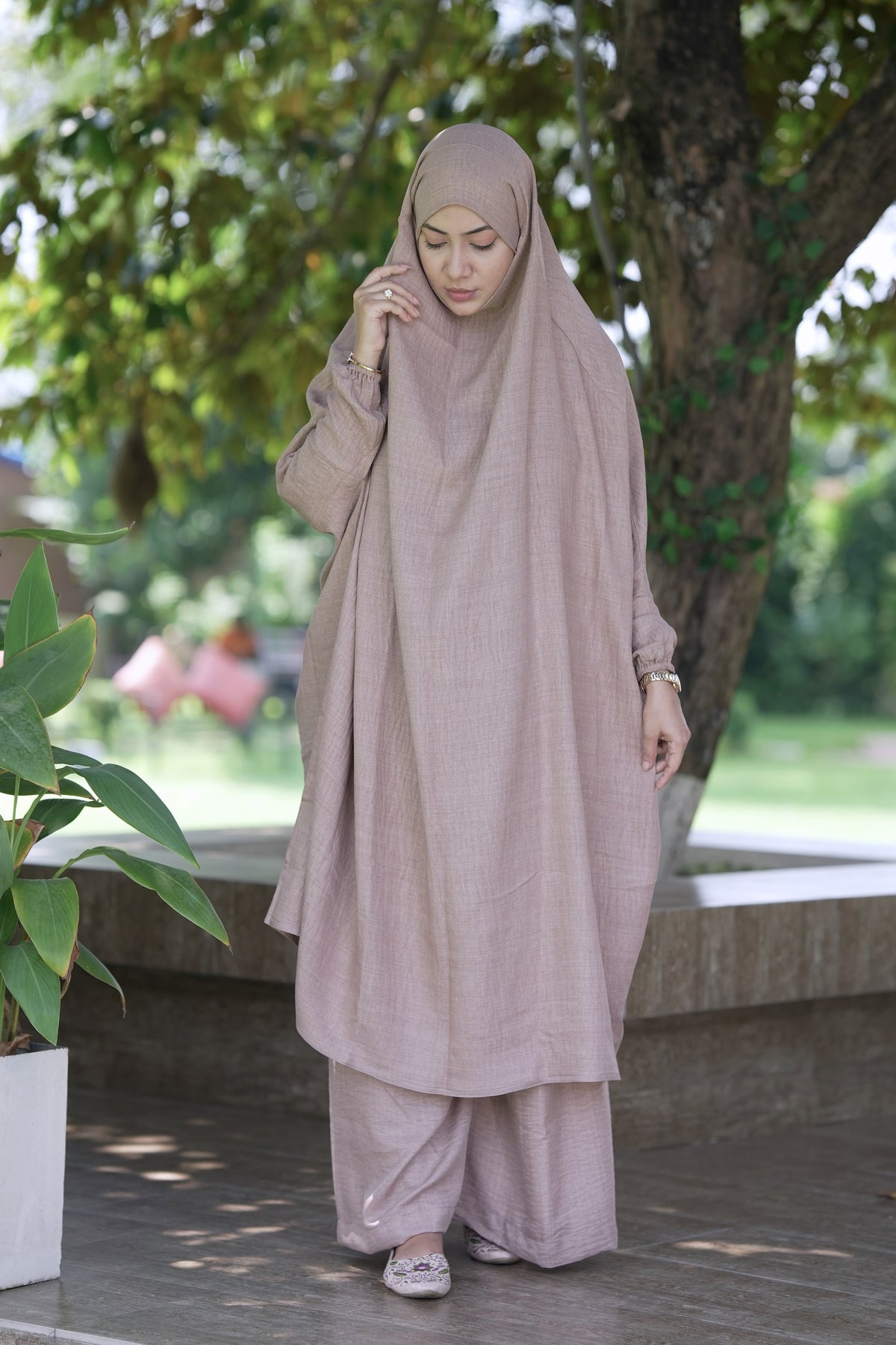 Standard length beige jilbab by Modest Collection featuring a comfortable one-size-fits-all head-down drape design for Muslim women seeking modest and breathable daily Islamic wear.