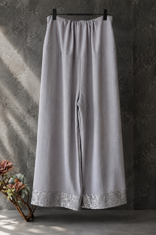 Ash sequin wide-leg formal pants by Modest Collection featuring an adjustable waist and elegant hem detailing, perfect for maternity and office wear.