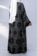 Full-length display of the Petra open layering shrug paired for a clean, modest aesthetic.