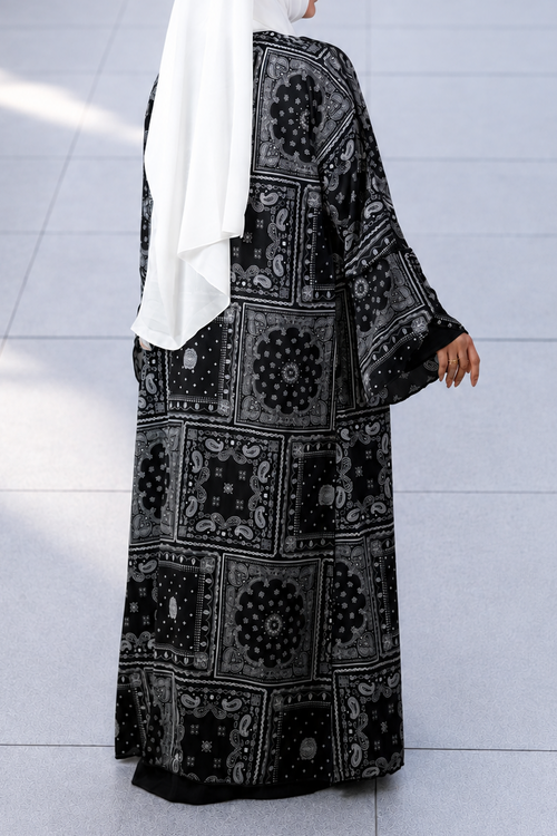 Full-length display of the Petra open layering shrug paired for a clean, modest aesthetic.