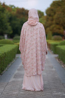 Back view of pink floral pattern batwing shrug