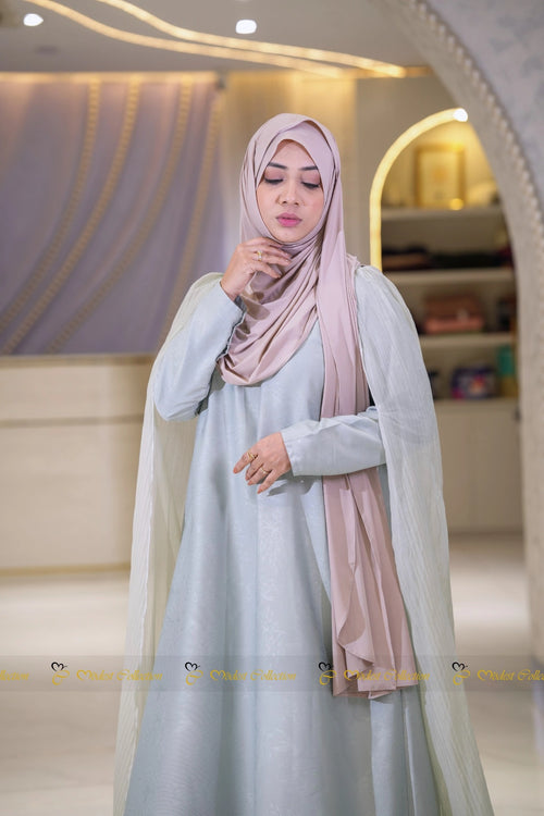 Luxury Elsa abaya dress for women with elegant modest silhouette and cape sleeves