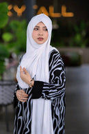 Woman wearing One Loop Jersey Hijab White in soft stretch jersey fabric