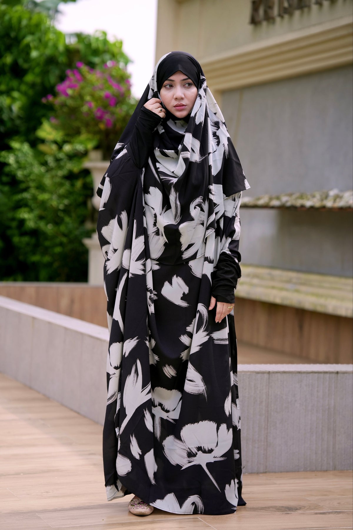 Lightweight, summer-friendly full-length printed black jilbab crafted from quality non-transparent georgette material.