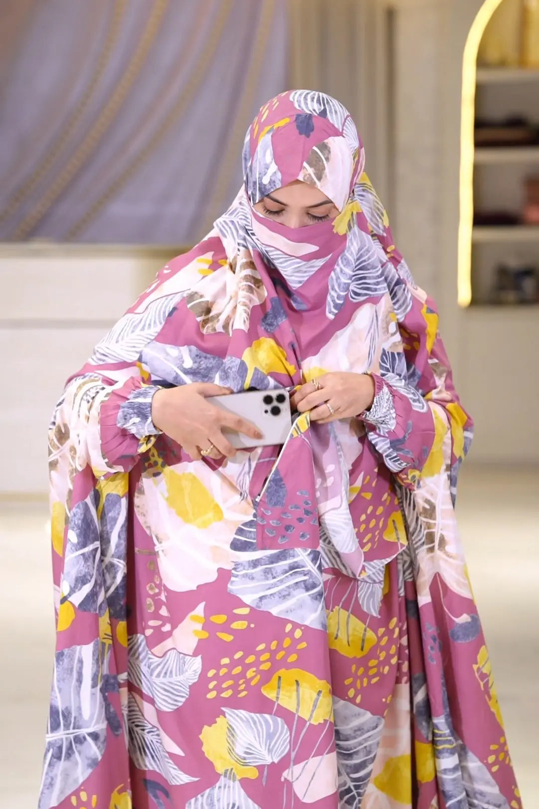 Woman wearing linen khimar with elegant modest fashion styling
